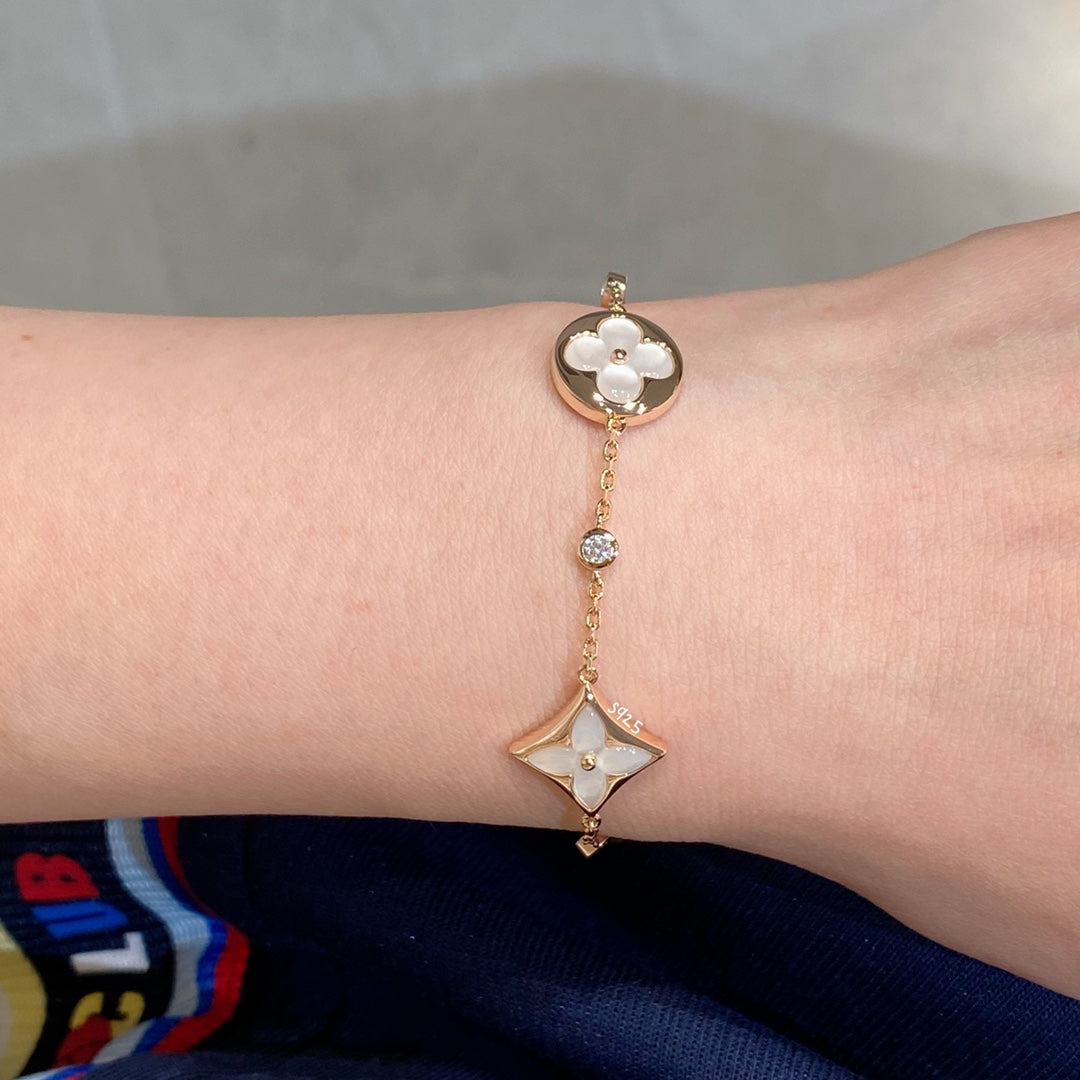 [Lira Jewelry]STAR AND SUN 4 MOTIF WHITE MOP PINK GOLD BRACELET