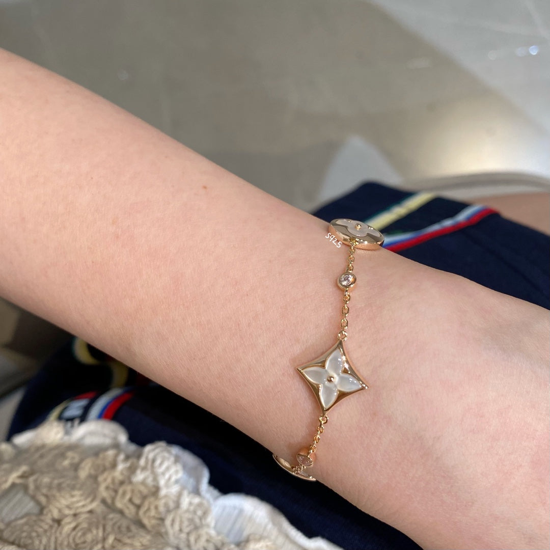 [Lira Jewelry]STAR AND SUN 4 MOTIF WHITE MOP PINK GOLD BRACELET