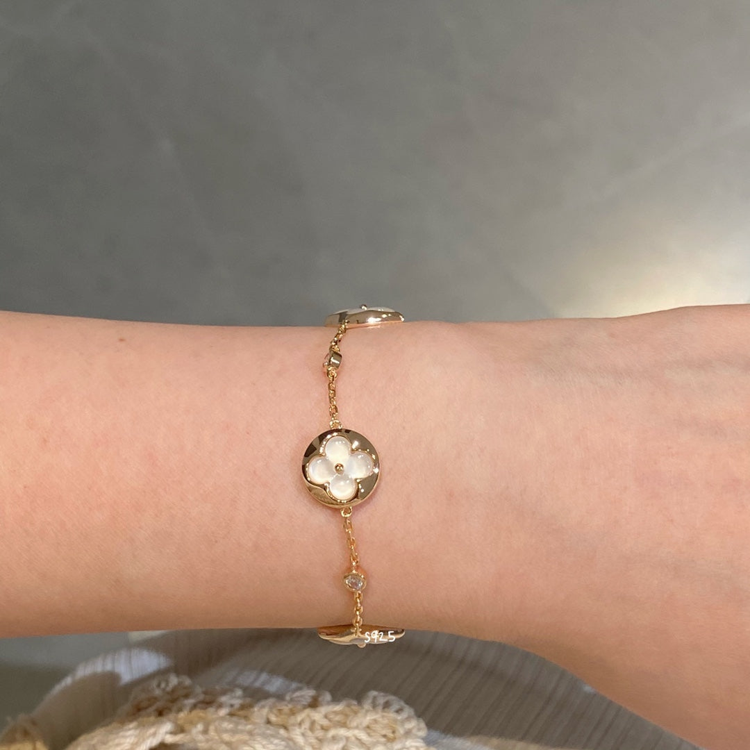 [Lira Jewelry]STAR AND SUN 4 MOTIF WHITE MOP PINK GOLD BRACELET